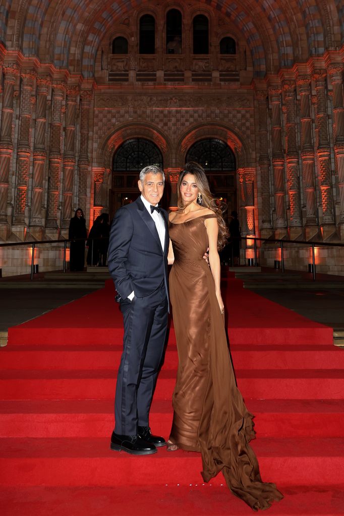 Amal Clooney and George Clooney on steps of the Natural History Museum 