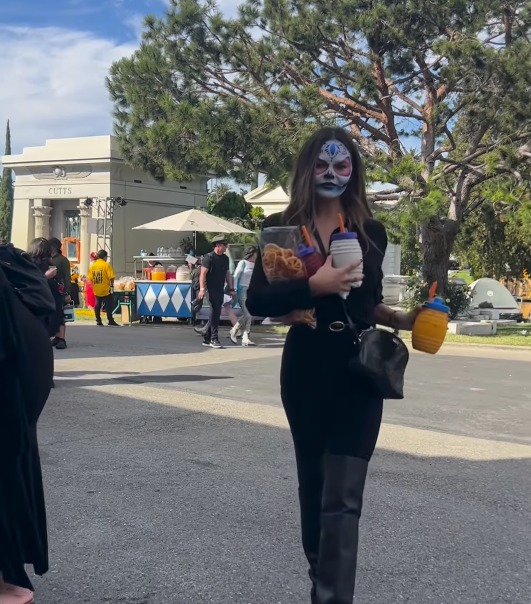 Chrissy Teigen in Day of the Dead face paint