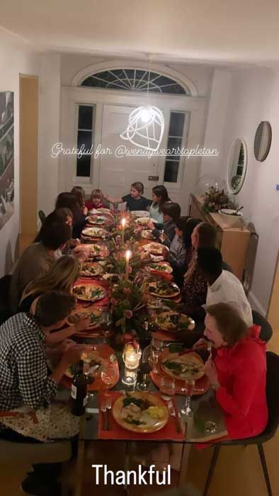 Jenna Bush Hager eating dinner with her family at a long table