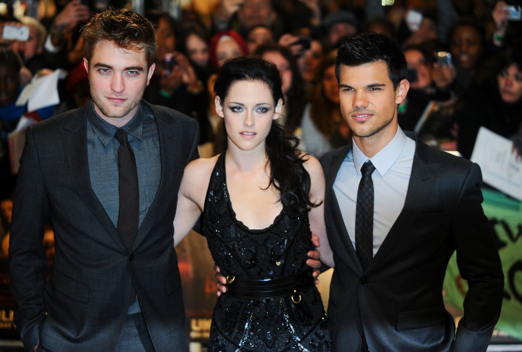Robert Pattinson, Kristen Stewart and Taylor Lautner attend the UK premiere of The Twilight Saga: Breaking Dawn Part 1 in 2011
