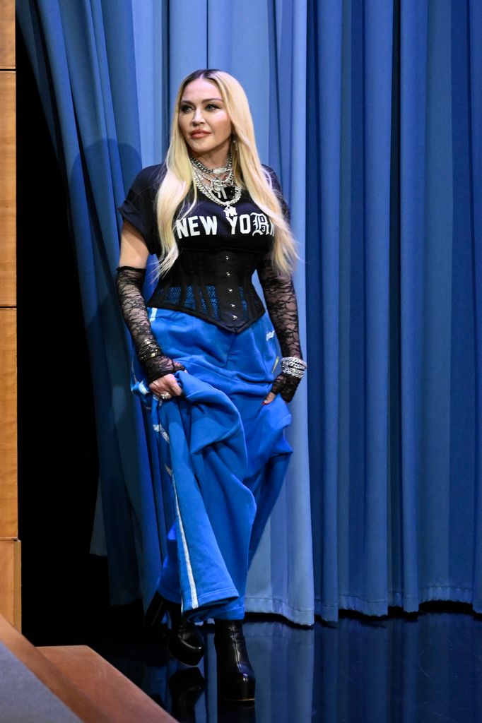 Dressed in a "New York" corseted top and blue skirt, Madonna appeared on the Tonight Show with Jimmy Fallon in August 2022