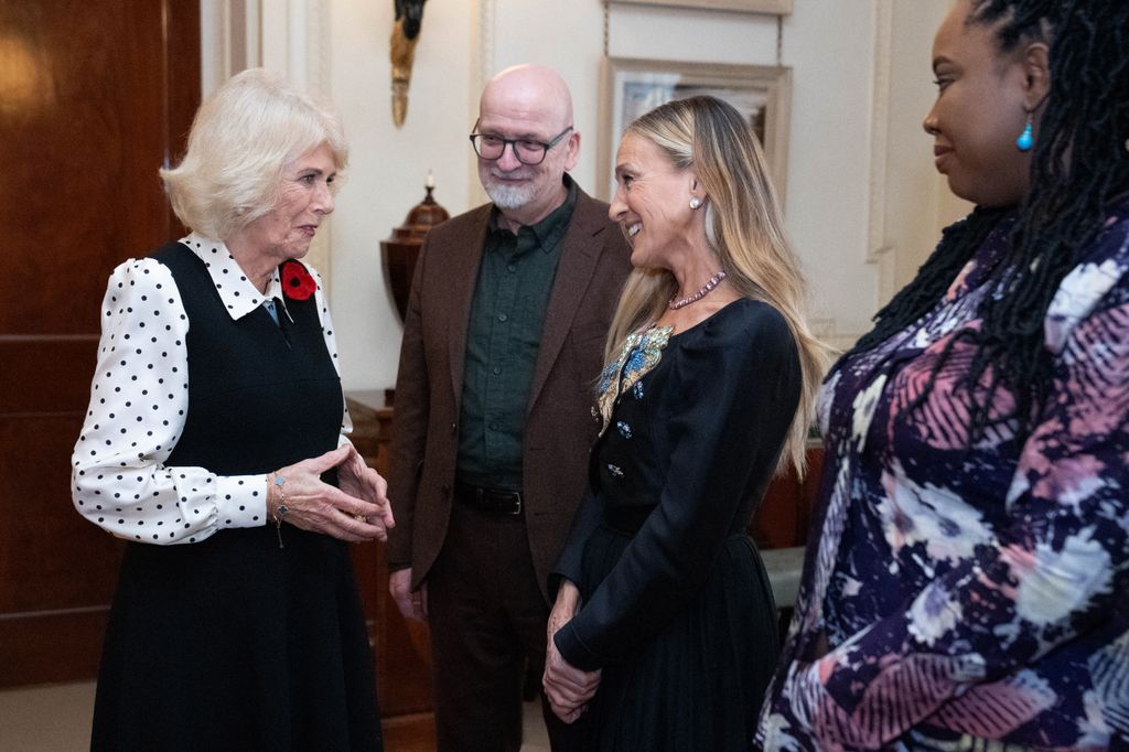 Queen Camilla speaking with this year's judges, including Sarah Jessica Parker