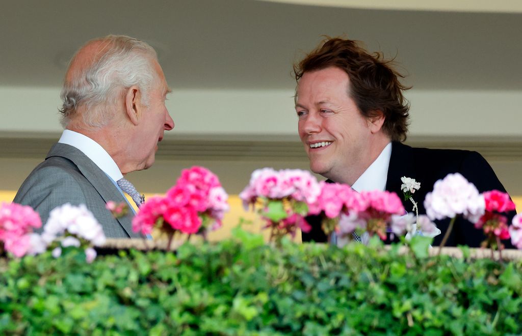 King Charles greets stepson Tom Parker Bowles