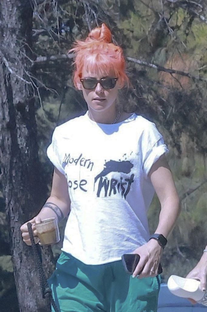 Kristen Stewart debuts a fresh hair color during a relaxed walk at Griffith Park with her wife Dylan Meyer and their dog