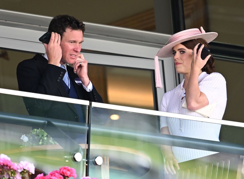 Jack Brooksbank and Princess Eugenie listening to their phones