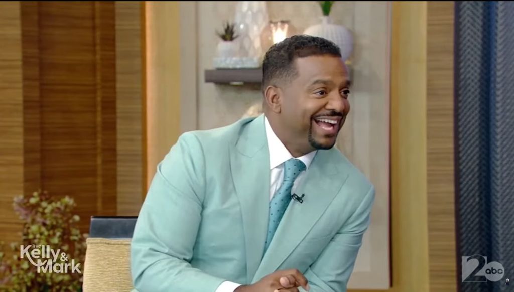 Alfonso Ribeiro sits alongside Kelly and Mark