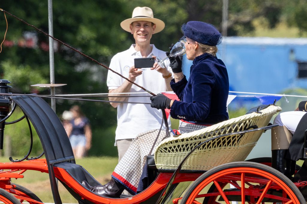 Prince Edward takes photos of Sophie during carriage driving drinking game
