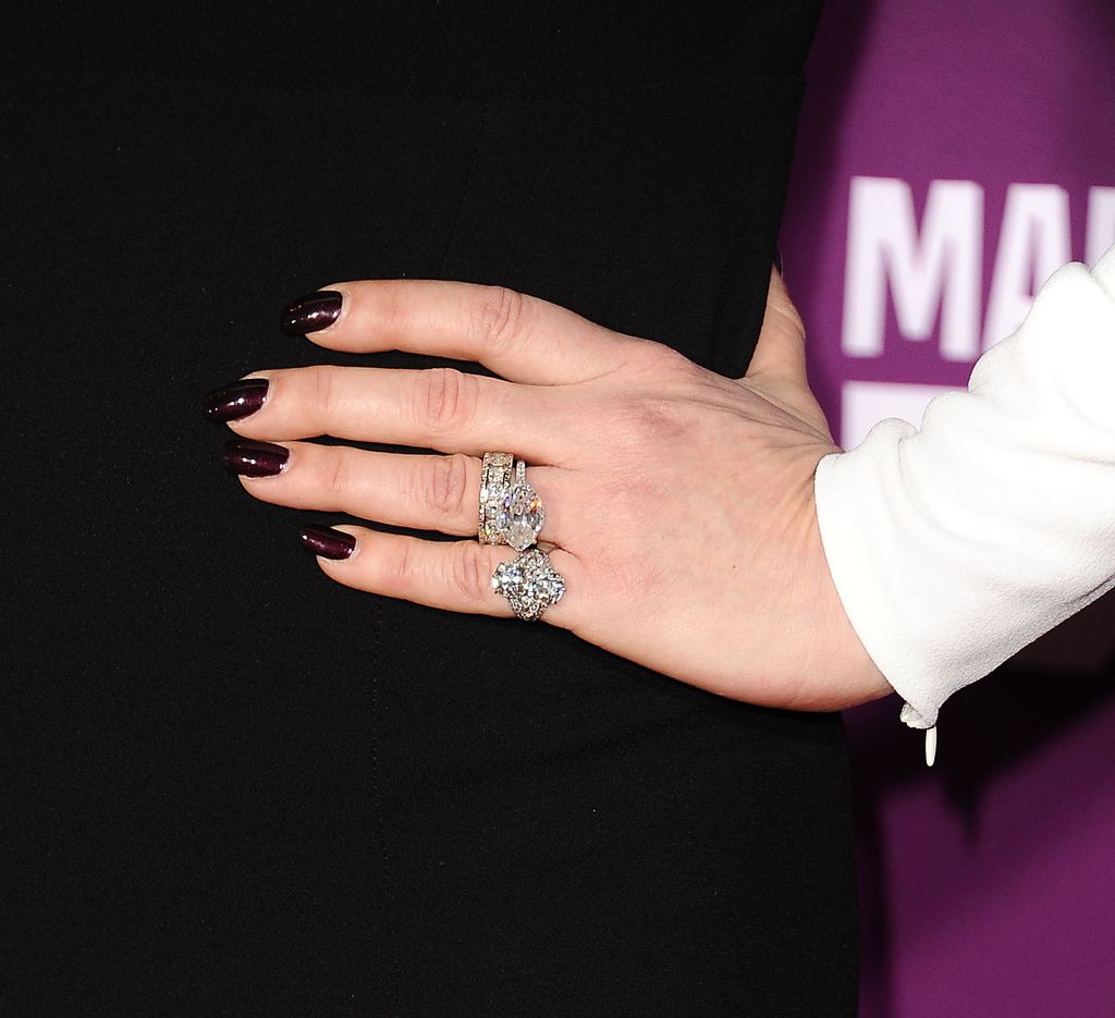  Catherine's hand with diamond rings on