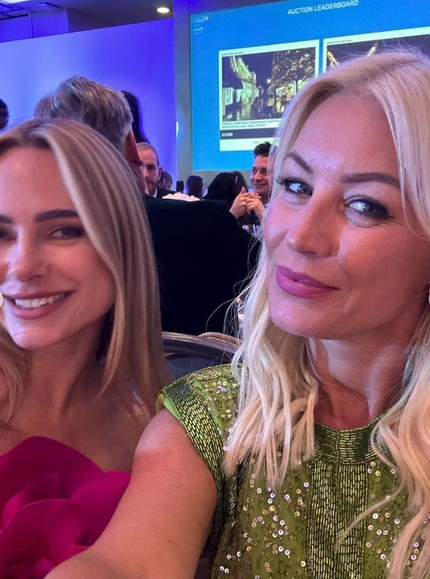 Denise van Outen sat with a blonde woman