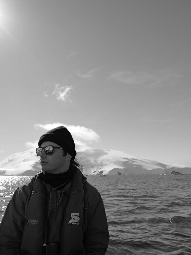 Dylan posing in Antarctica