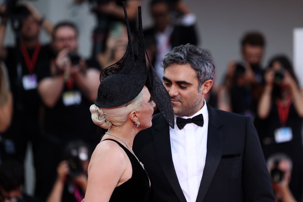 Lady Gaga and Michael Polansky attend the "Joker: Folie Ã  Deux" red carpet during the 81st Venice International Film Festival at Sala Grande on September 04, 2024 in Venice, Italy. (Photo by Maria Moratti/Getty Images)