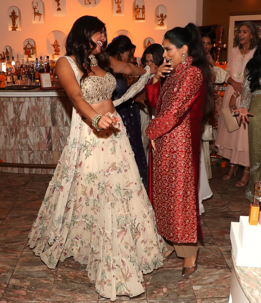 Priyanka Chopra Jonas and Lilly Singh attend the Phenomenal x Live Tinted Diwali Dinner Hosted by Mindy Kaling on November 03, 2021 in Los Angeles, California.