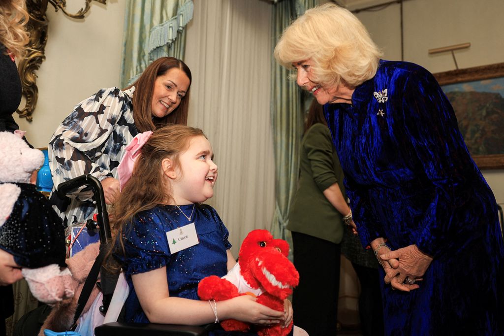 Camilla matched with a little girl named Chloe who was also wearing a blue dress