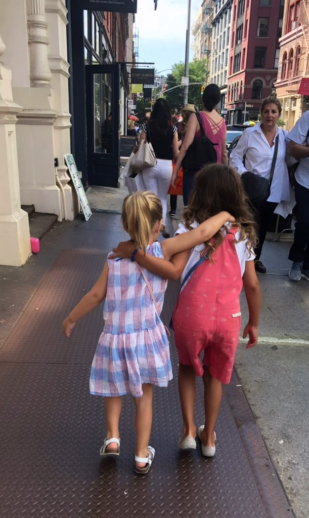 Throwback photo shared by Emma Heming on Instagram July 30, 2024 of her daughters with Bruce Willis during a trip to New York City