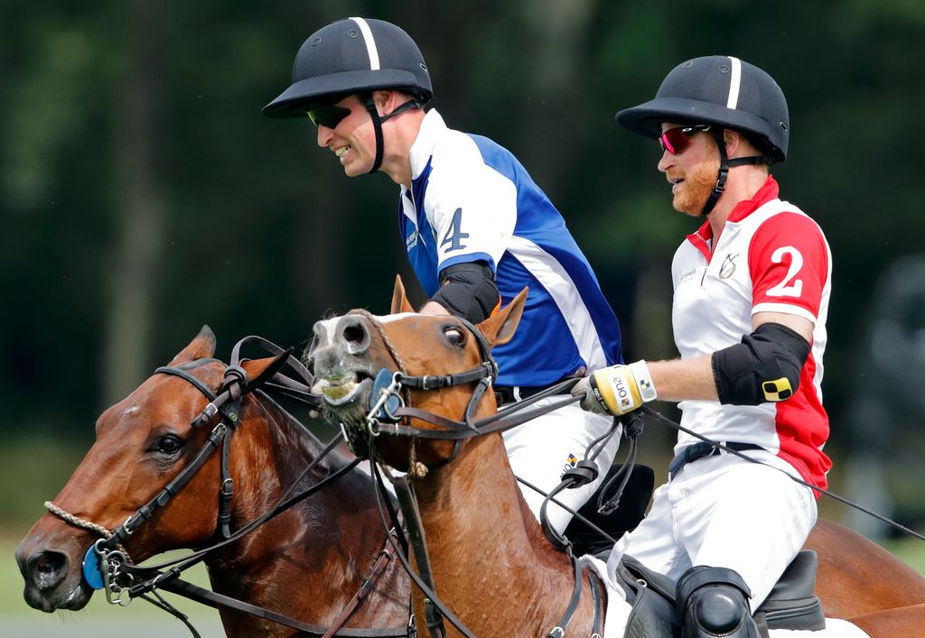 Prince William, Duke of Cambridge and Prince Harry, Duke of Sussex take part in the King Power Royal Charity Polo Match