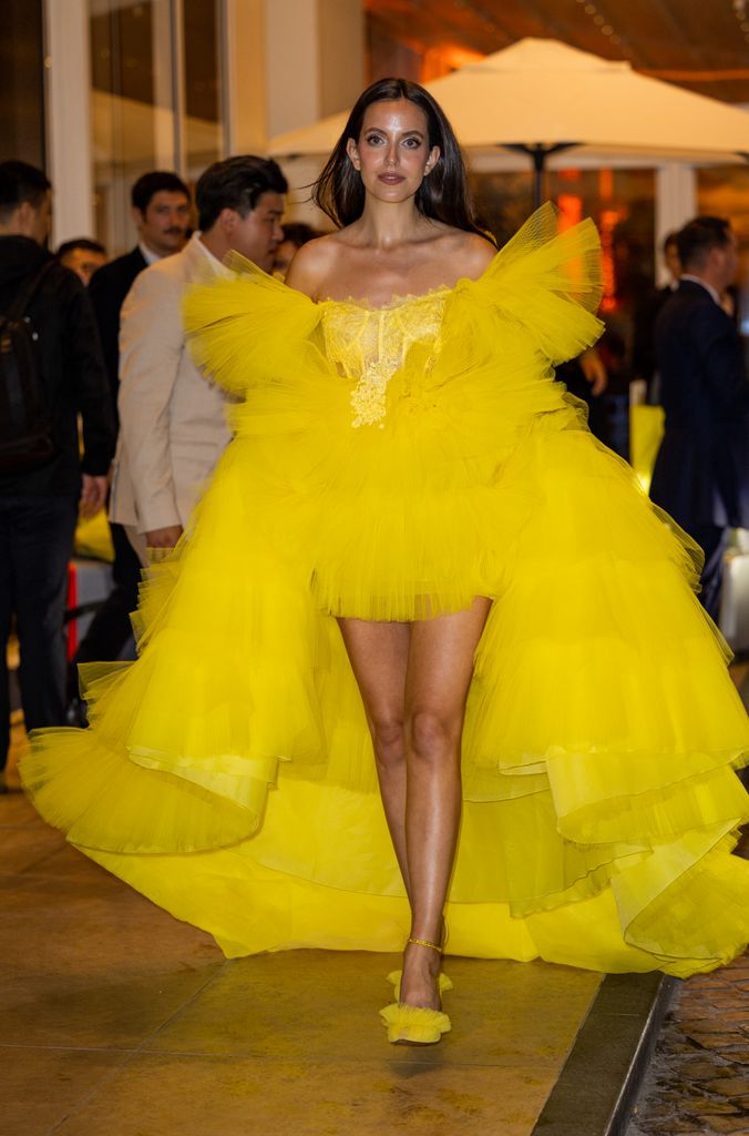 Marta Sierra channeled dopamine dressing in a stunning yellow tulle gown