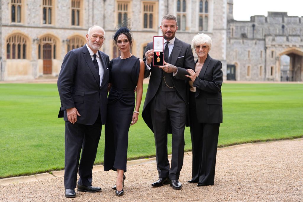 Sir David Beckham, with his wife Lady Victoria and parents Ted and Sandra Beckham, after he was made a Knight Bachelor at an investiture ceremony at Windsor Castle, Berkshire