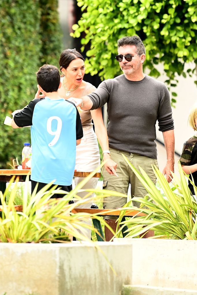 Simon Cowell enjoyed a lunch date with Lauren Silverman with son Eric in Malibu on Saturday