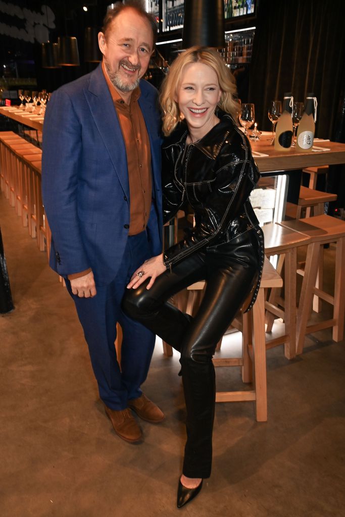 Cate smiling with her husband Andrew Upton 