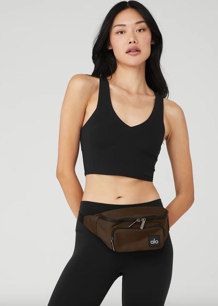 Model wearing the espresso fanny pack around her waist