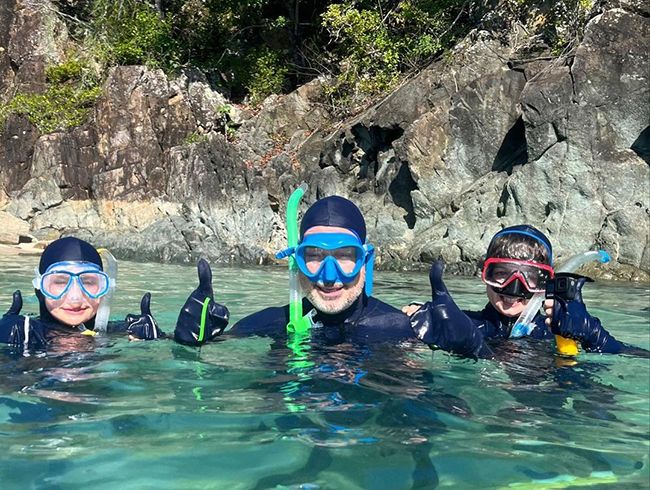 david furnish and their sons scuba diving