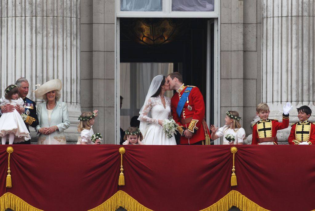 Grace van Custem covering her ears at the Prince and Princess of Wales' royal wedding kiss 