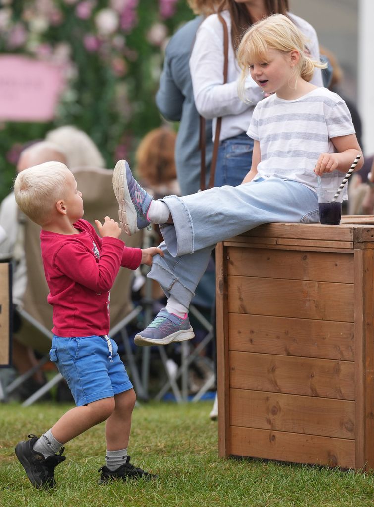 Lucas Tindall and Lena Tindall are seen at the Burghley Horse Trials at  Burghley House, Stamford, Lincolnshire on September 07, 2024 in Stamford, United Kingdom.