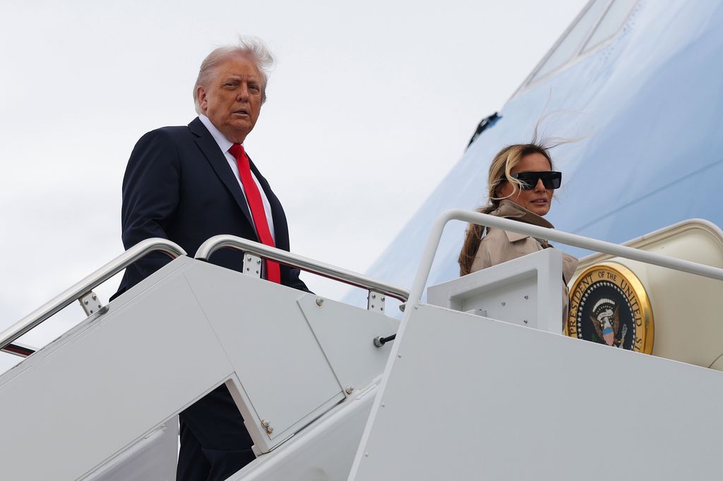 Donald Trump and Melania Trump boarding Air Force One