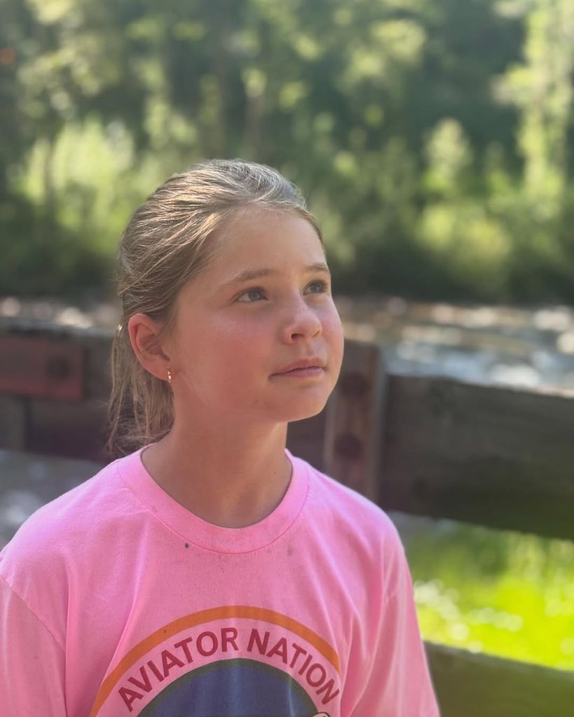 Jenna Bush Hager's daughter Mila poses for a sunkissed photo in their lawn shared on Instagram
