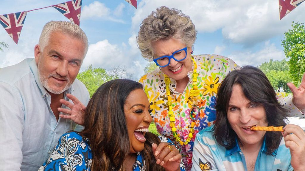 Paul Hollywood, Alison Hammond, Prue Leith and Noel Fielding laughing together on the Bake Off set 