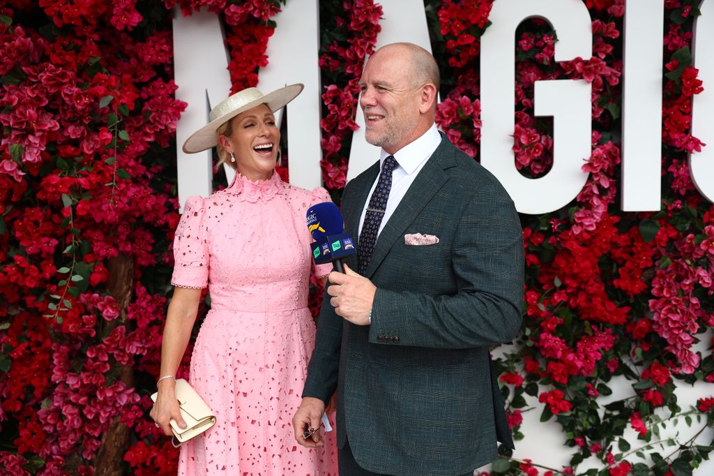 A photo of Mike and Zara Tindall talking into a microphone