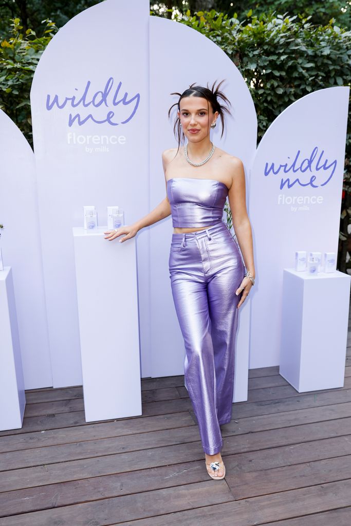 millie bobby brown looks stunning in purple during her appearance