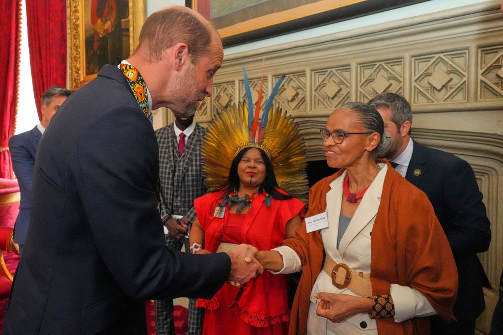 Britain's Prince William, Prince of Wales, as Founder of The Royal Foundation's United for Wildlife programme, speaks to Marina Silva, Minister of Environment and Climate, Brazil, right, and Sonia Guajajara, Minister of Indigenous Peoples, Brazil as he attends a high-level roundtable entitled 'Nature's Guardians' at St James's Palace on June 26, 2025 in London, England.