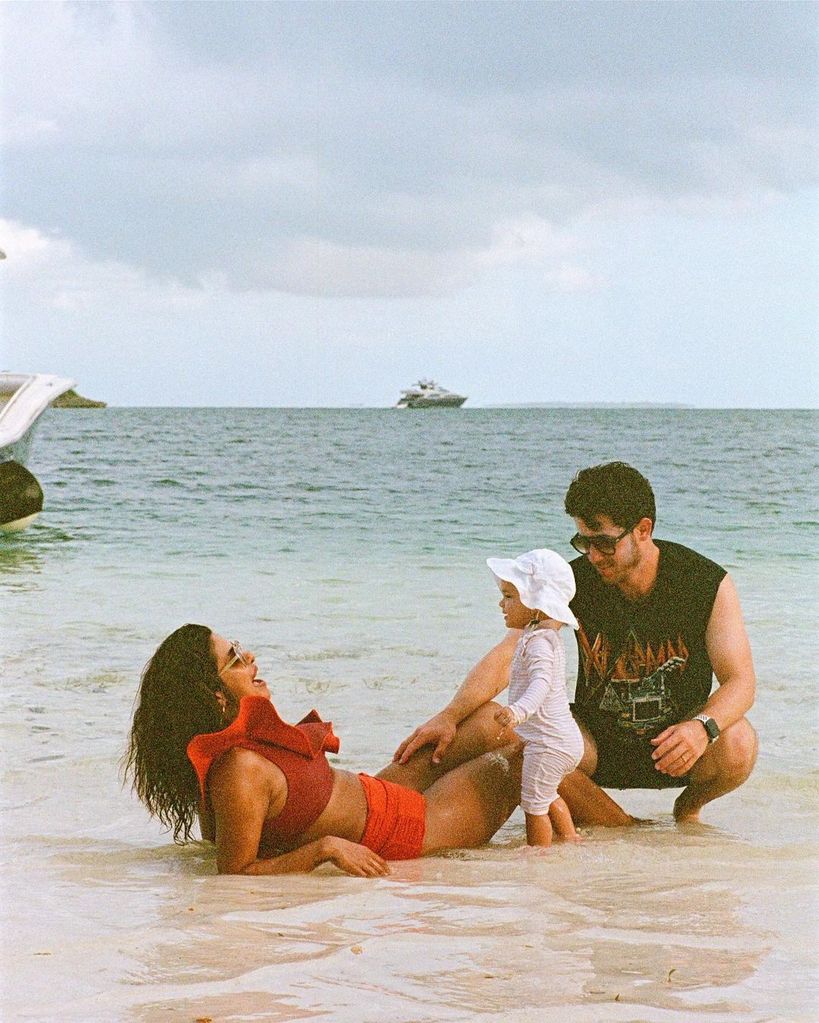 Priyanka stuns in red swimsuit with husband Nick and daughter Malti