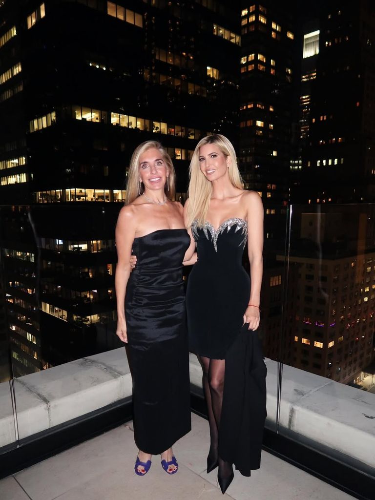 Ivanka Trump in black dress posing with Julie Shaffner Brawn in black dress