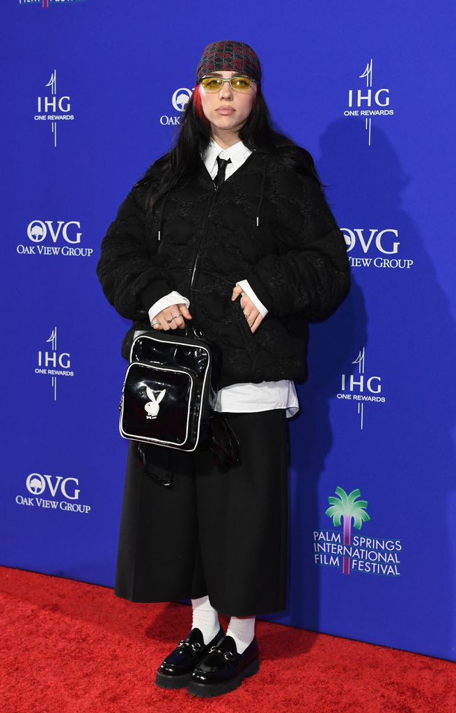 Billie Eilish wears a black suit as she is the Co-recipient of the Chairman's Award for "What Was I Made For?" from "Barbie" US singer Billie Eilish arrives for the 35th Annual Palm Springs International Film Festival Awards Gala at the Convention Center in Palm Springs, California, on January 4, 2024.