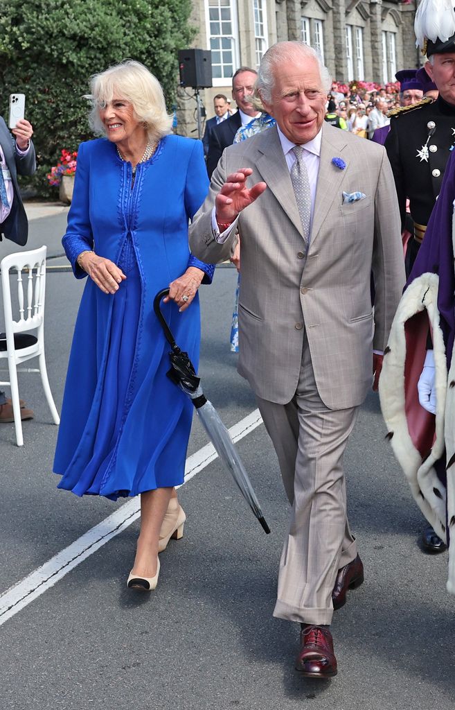 Queen Camilla and King Charles III arrive to much celebration from gathered well-wishers ahead of the Special Sitting of the States of Deliberation of Guernsey
