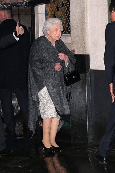 The Queen in a dress and shawl