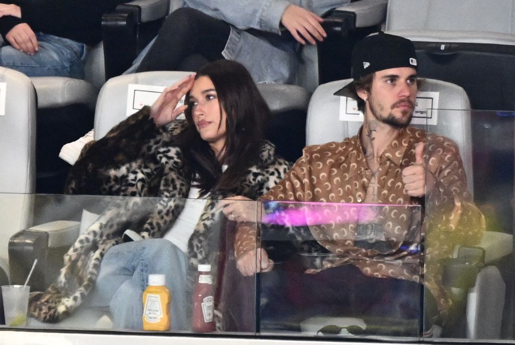 Canadian singer-songwriter Justin Bieber and his wife US model Hailey Bieber watch Super Bowl LVIII between the Kansas City Chiefs and the San Francisco 49ers at Allegiant Stadium in Las Vegas, Nevada, February 11, 2024.