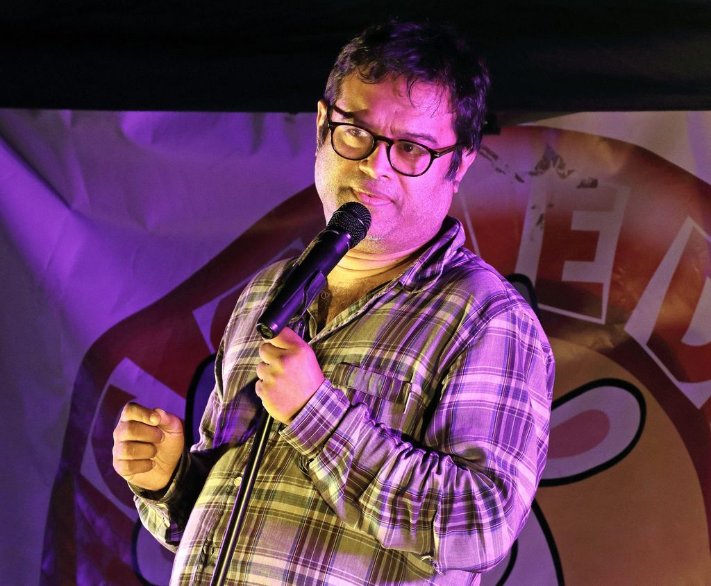 2CKXDP3 Flitwick. Hertfordshire. UK.    Paul Sinha - aka The Sinnerman from TVs The Chase - performs a live socially distanced outside stand up comedy night at the Rufus Centre, Flitwick, Bedfordshire.  Sinha was diagnosed with Parkinsons Disease, a year ago and said he was determined to "fight this with every breath I have". 12th September 2020. Ref:LMK73-S3121130920 Keith Mayhew/Landmark Media  .