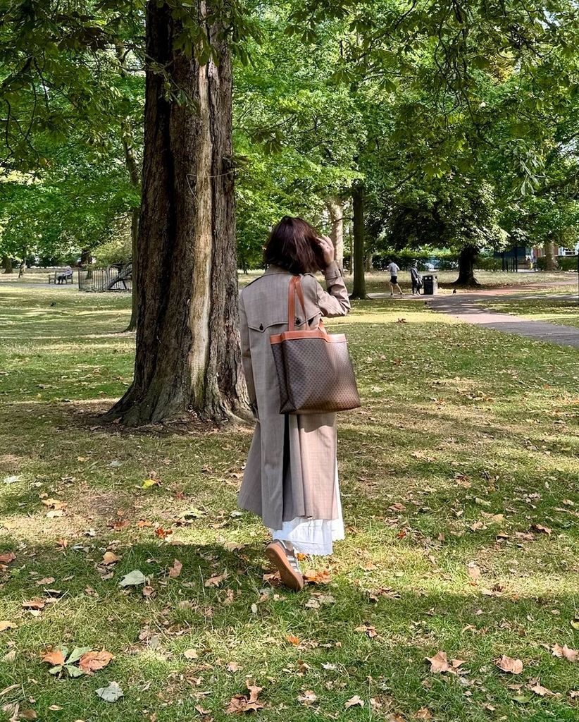 She donned a vintage Celine Macadam tote