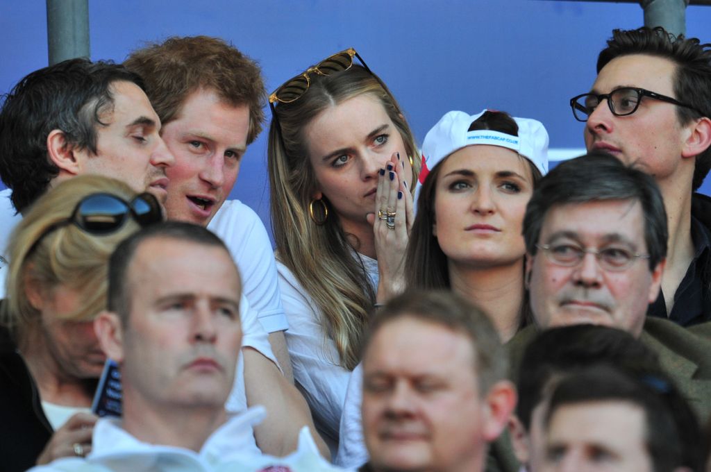 Prince Harry and Cressida Bonas in the stands watching the Six Nations rugby in 2014