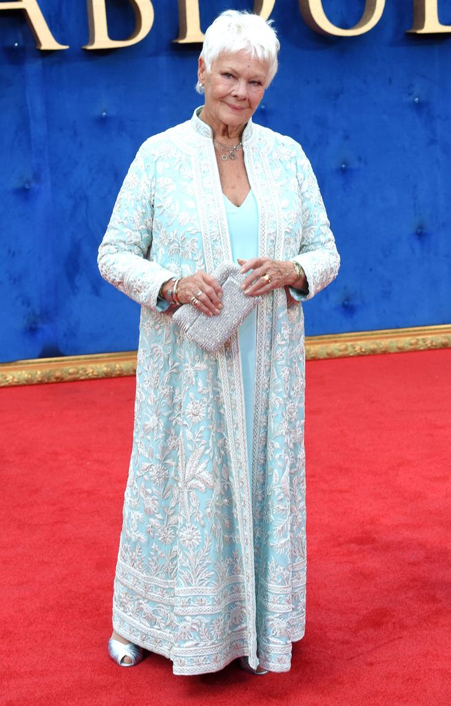 judi dench in sky blue outfit