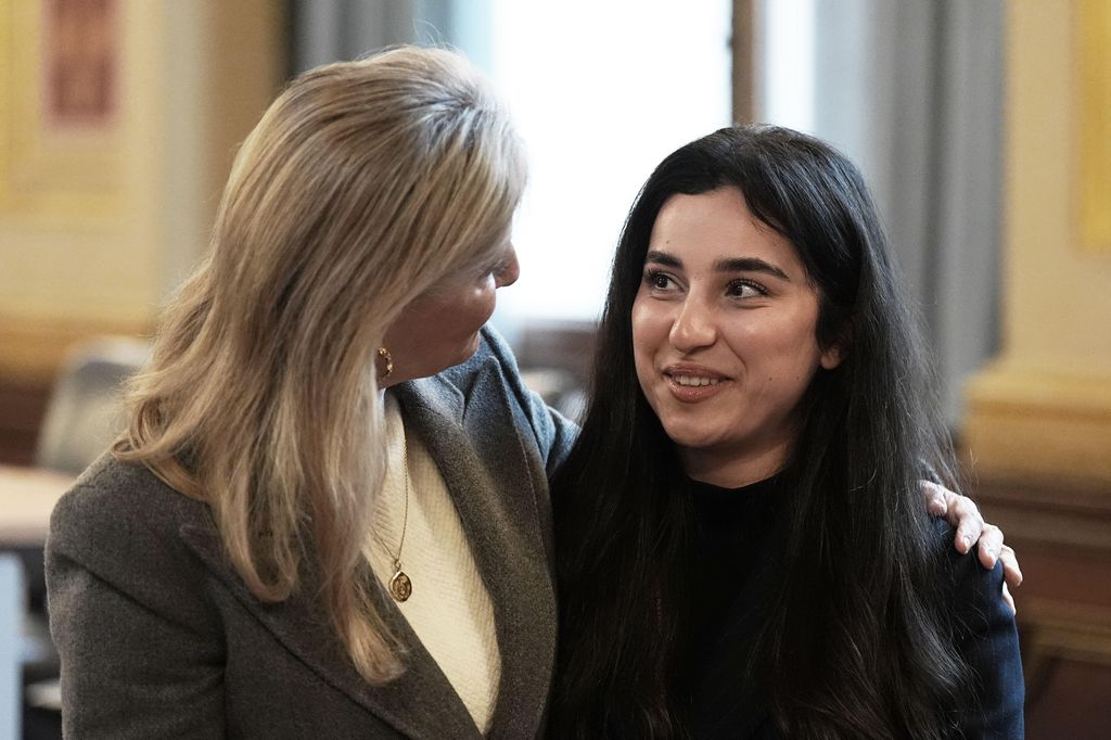 The Duchess of Edinburgh speaking to Yazidi survivor Awaz Abdi