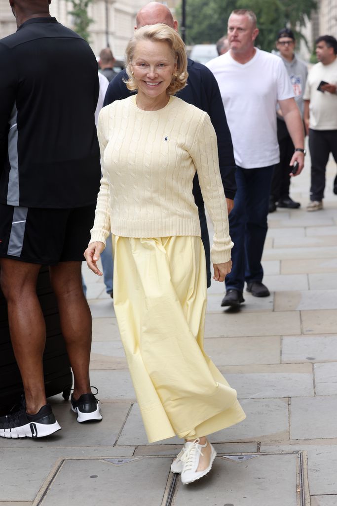 Pamela Anderson leaving the Corinthia Hotel whilst promoting new movie 'The Naked Gun' on July 23, 2025 in London, England