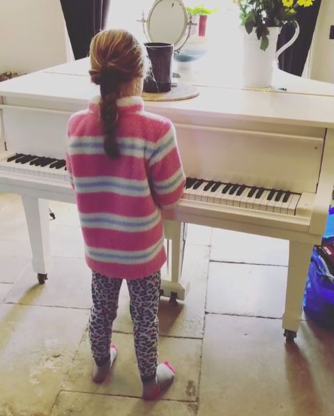 Daisy Barlow playing piano