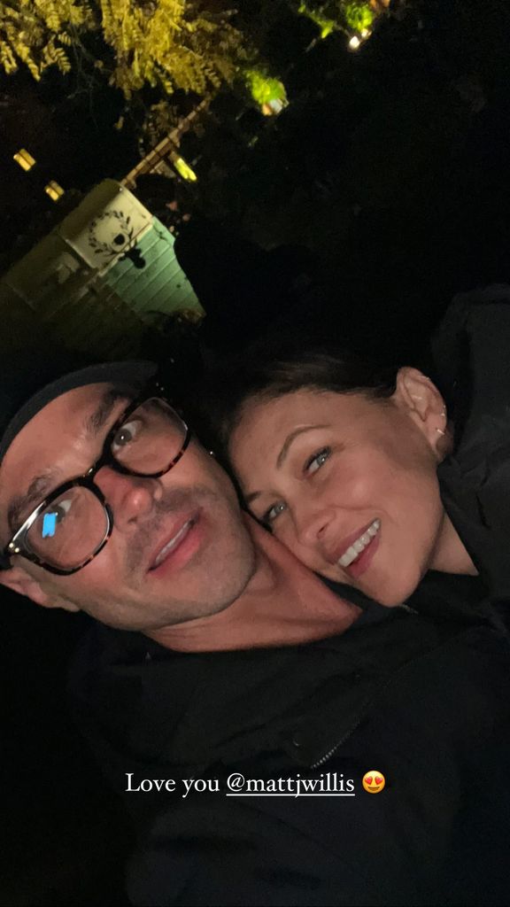 Emma and Matt Willis posing for a selfie in the night