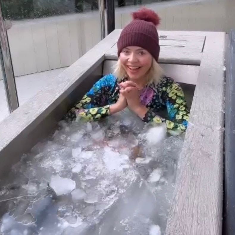Holly Willoughby in a beanie hat in an ice bath