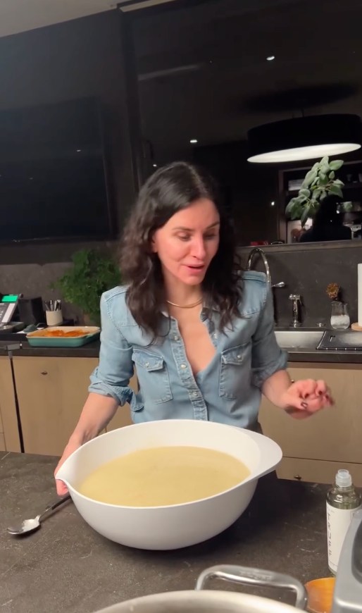 The actress' kitchen has a flat-screen TV