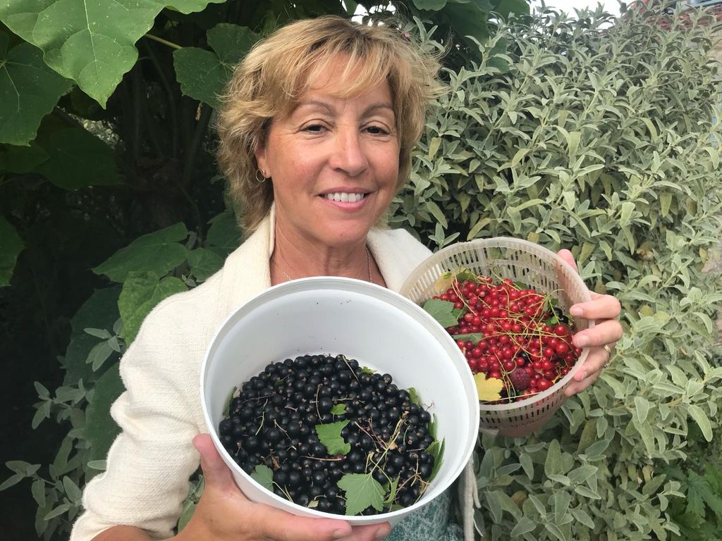 Rebecca Pow MP posing with homegrown berries